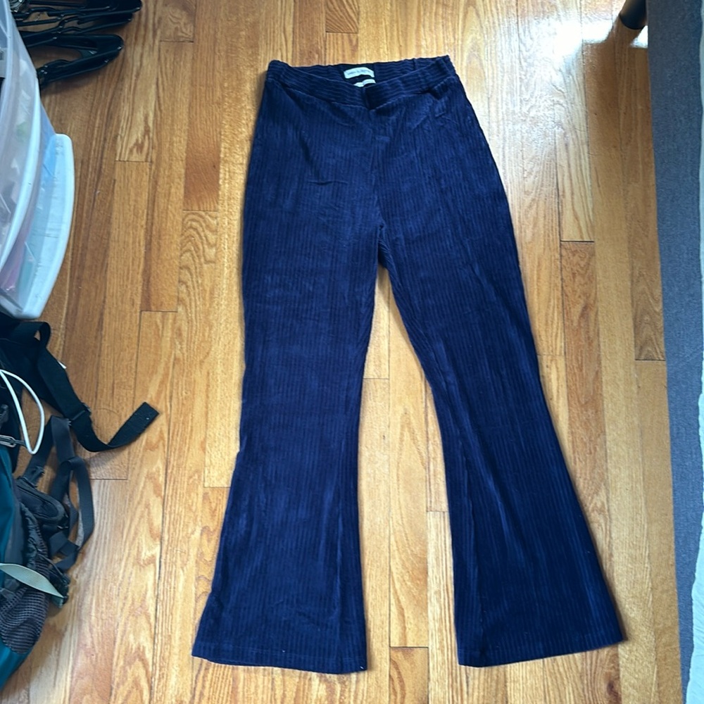 Flared, ribbed, navy pants.